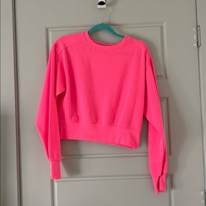 Neon pink crop workout sweatshirt